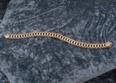 Lot 68 - A 9ct gold bi metal flattened link bracelet
