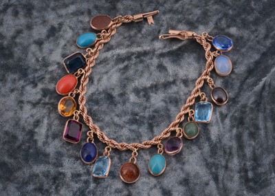 Lot 73 - A multi gem set 9ct gold bracelet