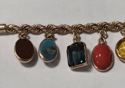 Lot 73 - A multi gem set 9ct gold bracelet