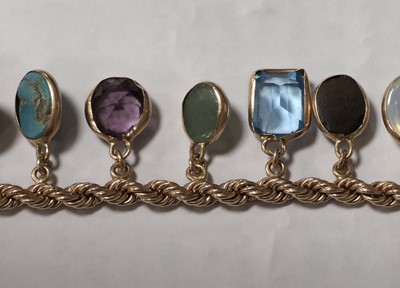 Lot 73 - A multi gem set 9ct gold bracelet