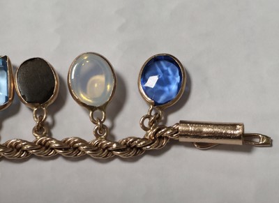 Lot 73 - A multi gem set 9ct gold bracelet