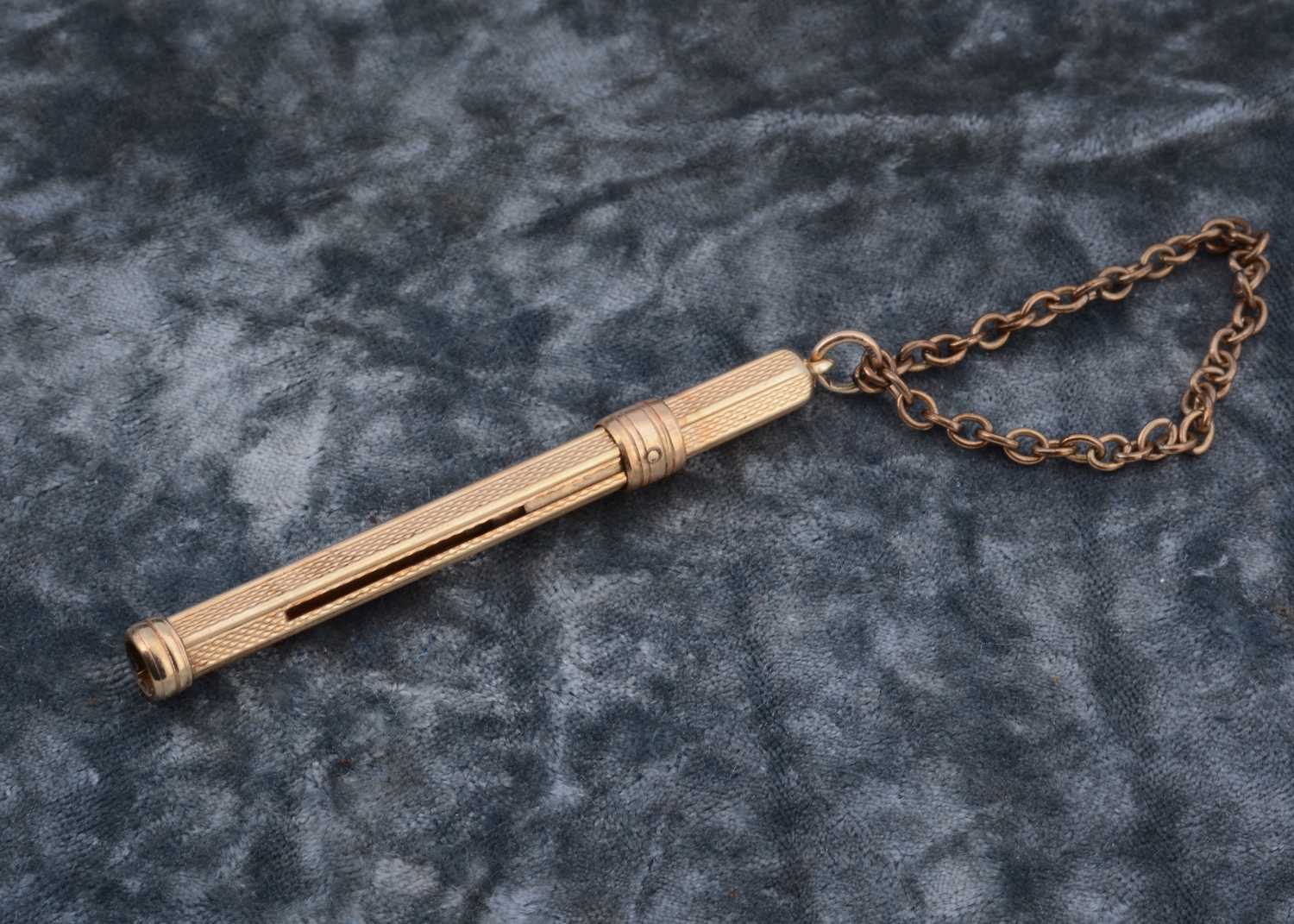 Lot 79 - A 9ct gold toothpick fob