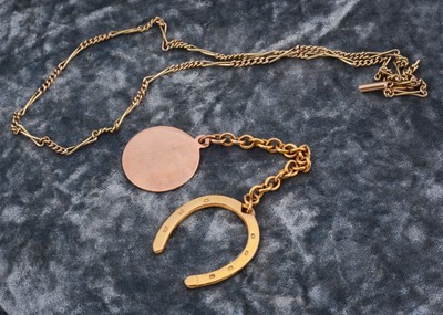 Lot 109 - A 9ct gold horseshoe and fob key chain
