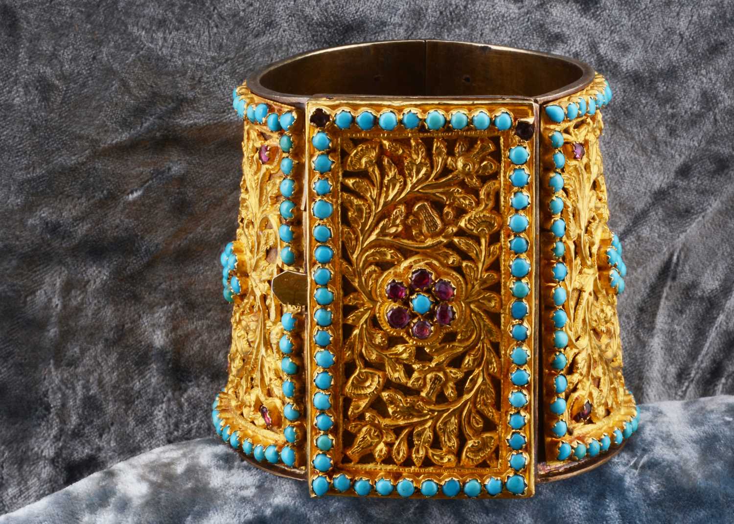 Lot 119 - A 19th Century Indian silver gilt and gold cuff bangle