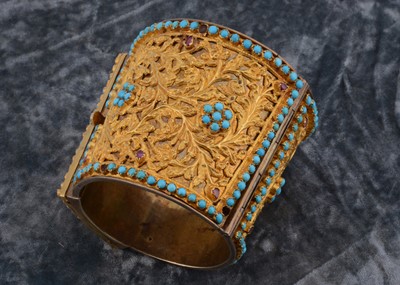 Lot 119 - A 19th Century Indian silver gilt and gold cuff bangle