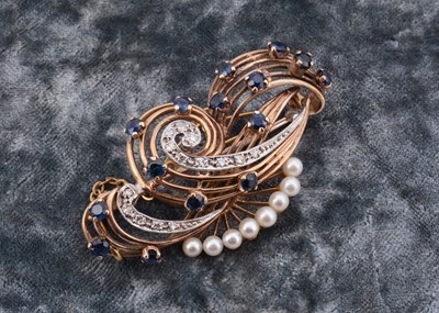 Lot 132 - A double scroll sapphire and diamond 9ct gold brooch