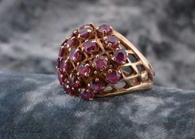 Lot 136 - A 9ct gold ruby dress ring