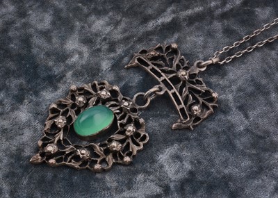 Lot 154 - A continental 800 marked silver chalcedony set pendant and chain
