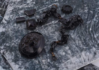 Lot 155 - A 19th Century carved jet fob chain