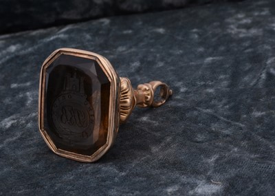 Lot 158 - A 19th Century gilt metal and smoky quartz fob