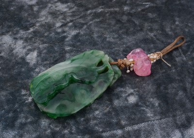 Lot 166 - A 19th Century carved Chinese jadeite jade and tourmaline pendant