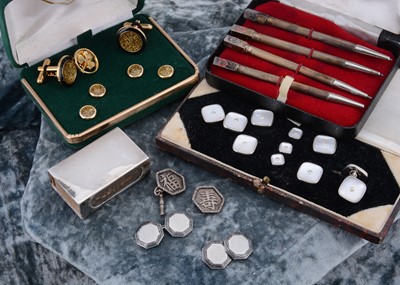 Lot 167 - A pair of base metal and enamel cufflinks