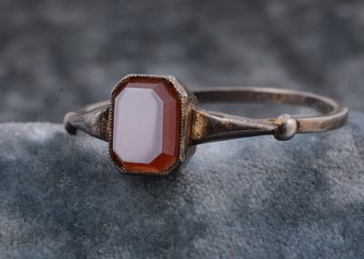 Lot 187 - A Scottish hardstone shield shaped stick pin