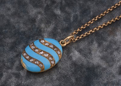 Lot 197 - A 19th century yellow metal diamond and turquoise oval open box back locket