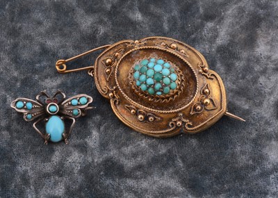 Lot 198 - A Victorian oval turquoise and yellow metal brooch