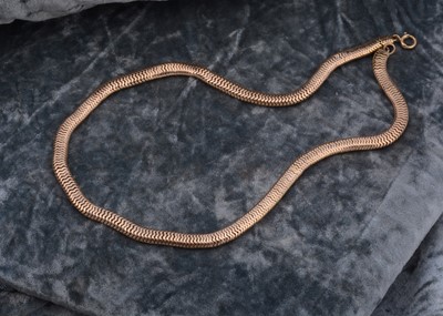 Lot 206 - A yellow metal snake link flattened necklace