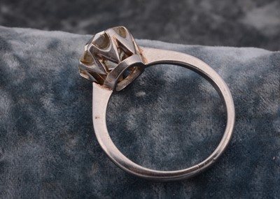 Lot 219 - An old cut diamond solitaire