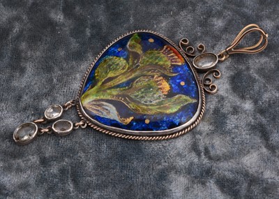 Lot 225 - An Arts and crafts silver, gold and enamel gem set pendant