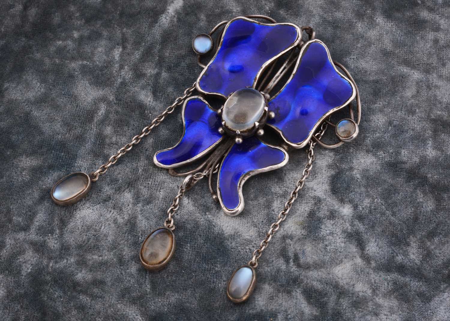 Lot 226 - Charles Robert Ashbee 1865-1942 for the Guild of Handicraft Ltd, silver enamel and moonstone Arts and Crafts pendant