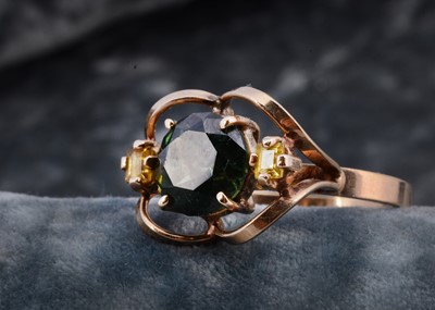 Lot 274 - A continental gold three stone sapphire dress ring