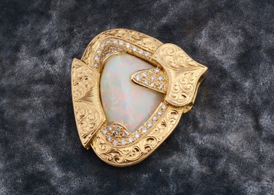 Lot 275 - A precious opal and 18ct gold diamond double sided pendant