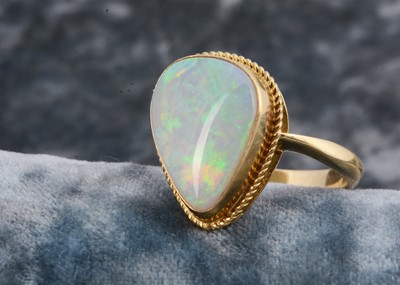 Lot 280 - A precious opal 18ct gold dress ring