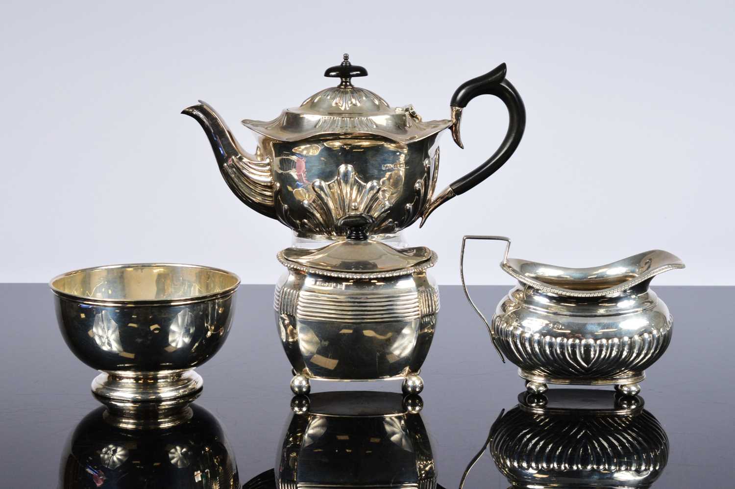 Lot 325 - Four Victorian and later tea related items of silver