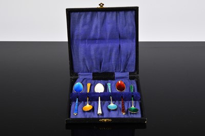 Lot 335 - A set of six cased Danish silver gilt and enamelled coffee spoons