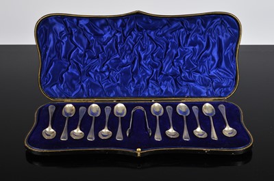 Lot 342 - An early George V cased set of twelve silver coffee spoons with sugar tongs by William Hutton & Sons