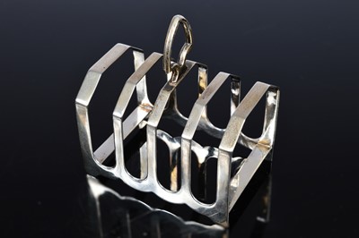 Lot 349 - A George V silver toast rack from Viners
