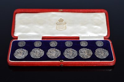 Lot 364 - A cased set of twelve Edwardian silver buttons