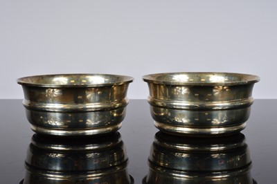 Lot 382 - A pair of 1970s silver wine bottle coasters from S.J.P