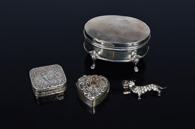 Lot 385 - Four collectable silver items