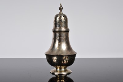 Lot 410 - A George V silver sugar sifter by Thomas Bradbury & Sons