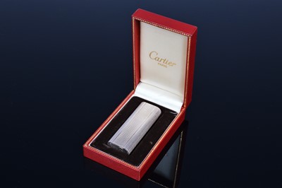 Lot 423 - A cased Cartier cigarette lighter