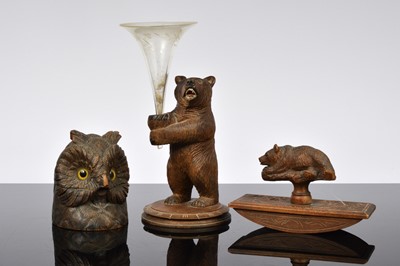 Lot 451 - Three late 19th century and later Black Forest carved wooden items