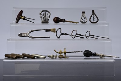 Lot 454 - A group of travel cork screws and other wine tools