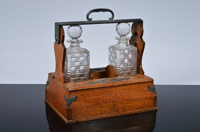 Lot 498 - A Victorian oak tantalus