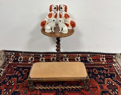 Lot 504 - A Victorian wine table together with a footstool and two pairs of Staffordshire Pottery spaniels