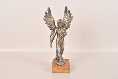 Lot 195 - A cast metal figure of a Saint or Angel