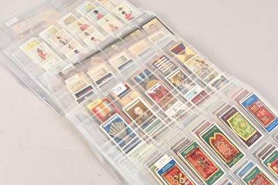 Lot 481 - Pre and Post War Cigarette and Trade Card Historical Military Themed Sets Includes Medals Flags and Banners (33)