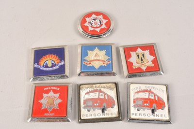 Lot 523 - A group of Fire Service Car Badges