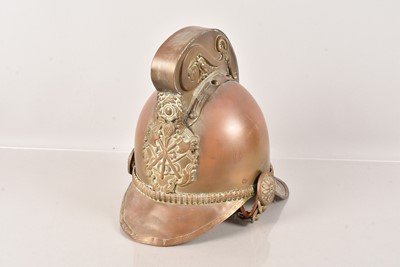 Lot 532 - A decorative Reproduction Brass Fire Helmet