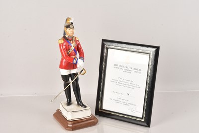 Lot 578 - A Royal Worcester statuette of an Officer in the Palatine Guard