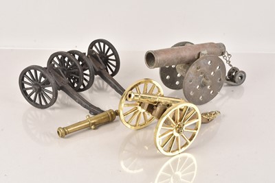 Lot 618 - A small group of Desk Cannon Ornaments