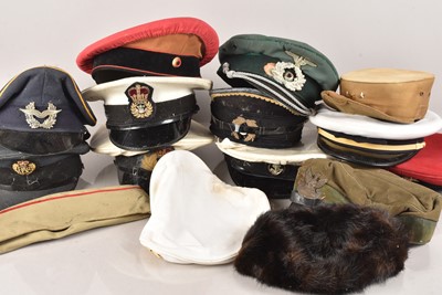 Lot 640 - A large collection of Peak Caps