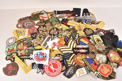 Lot 659 - A collection of WWII and later Cloth and Bullion badges