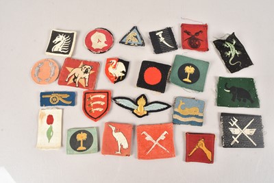 Lot 666 - A collection of British and Overseas cloth badges