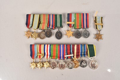 Lot 692 - A collection of Miniature medal groups