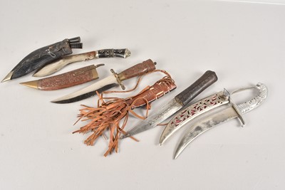 Lot 808 - A group of Four Middle Eastern Knives and Daggers